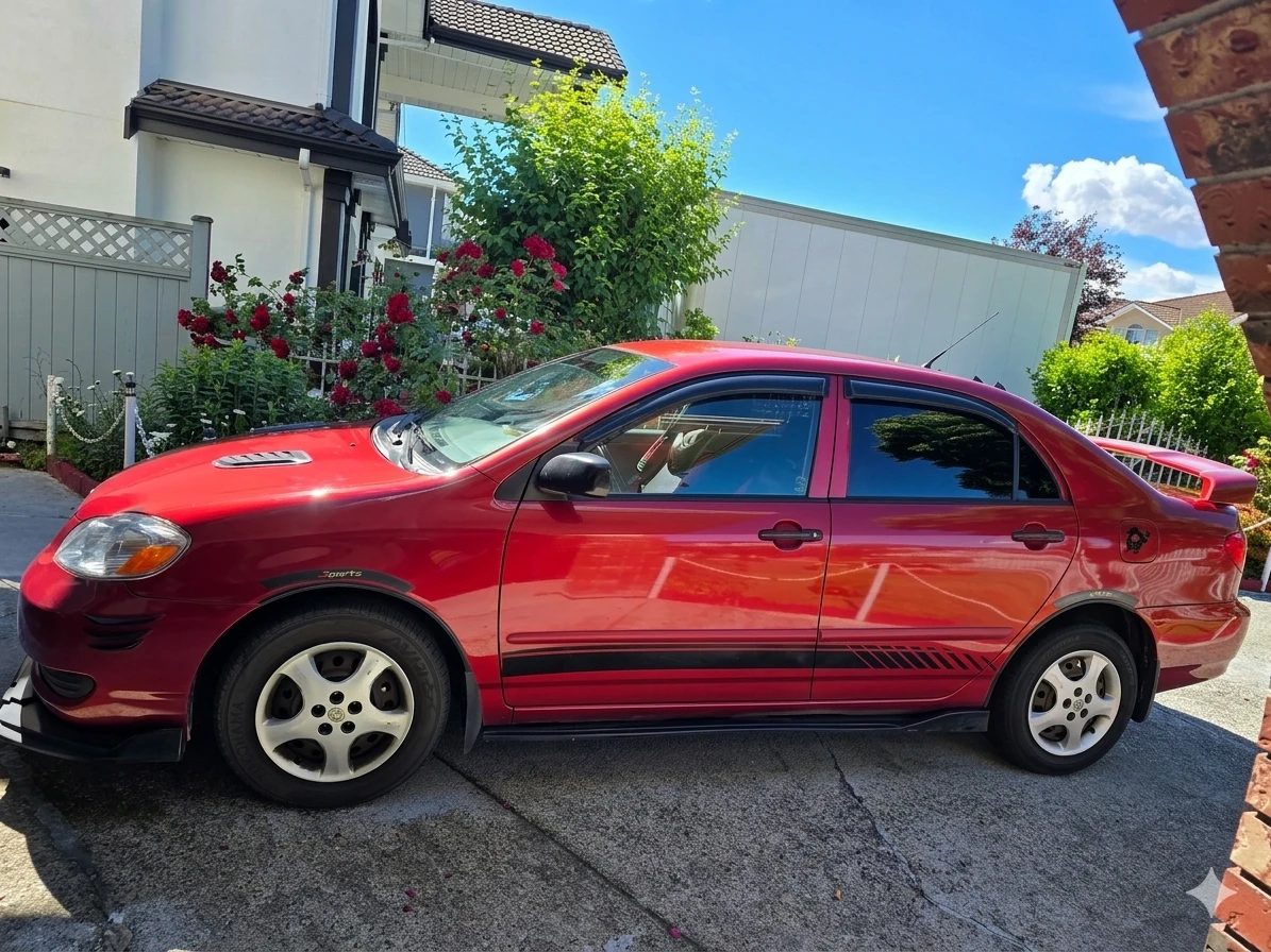 Red Toyota Corolla - photo 2