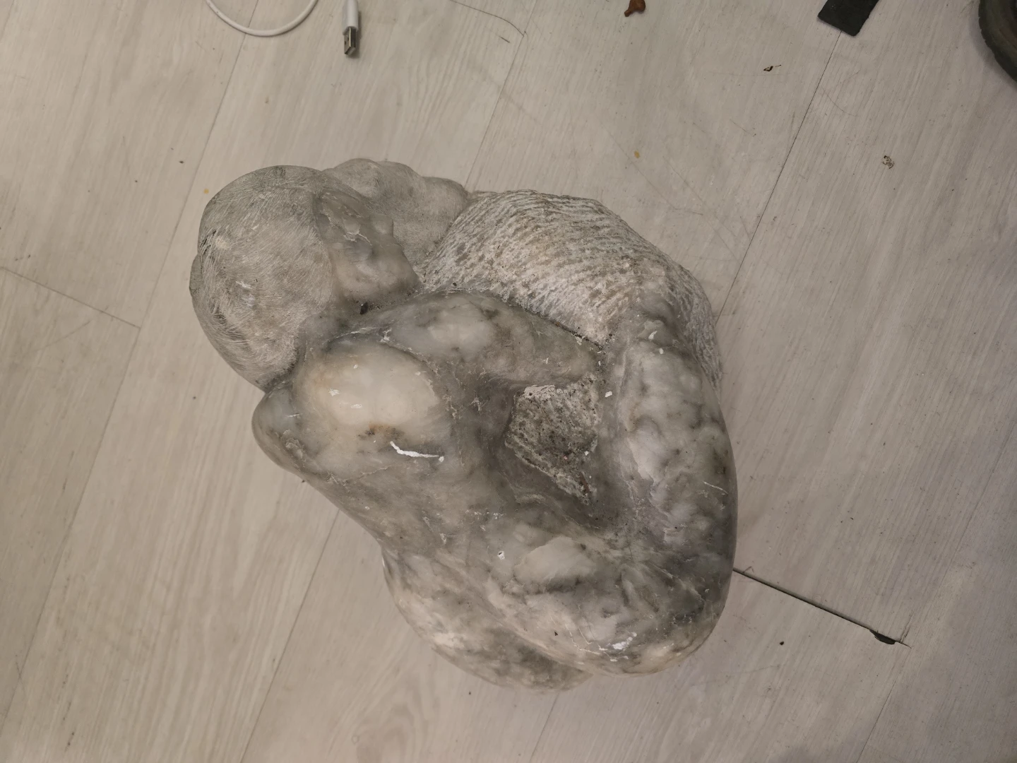 Sculpture of embracing figures