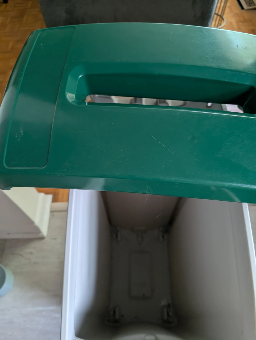 Green and White Plastic Storage Bin