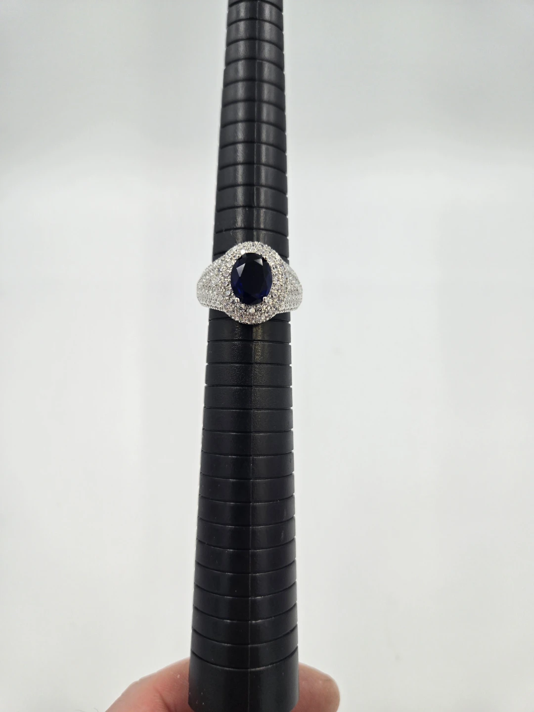 Oval Blue Gemstone Ring with Pave Set White Stones