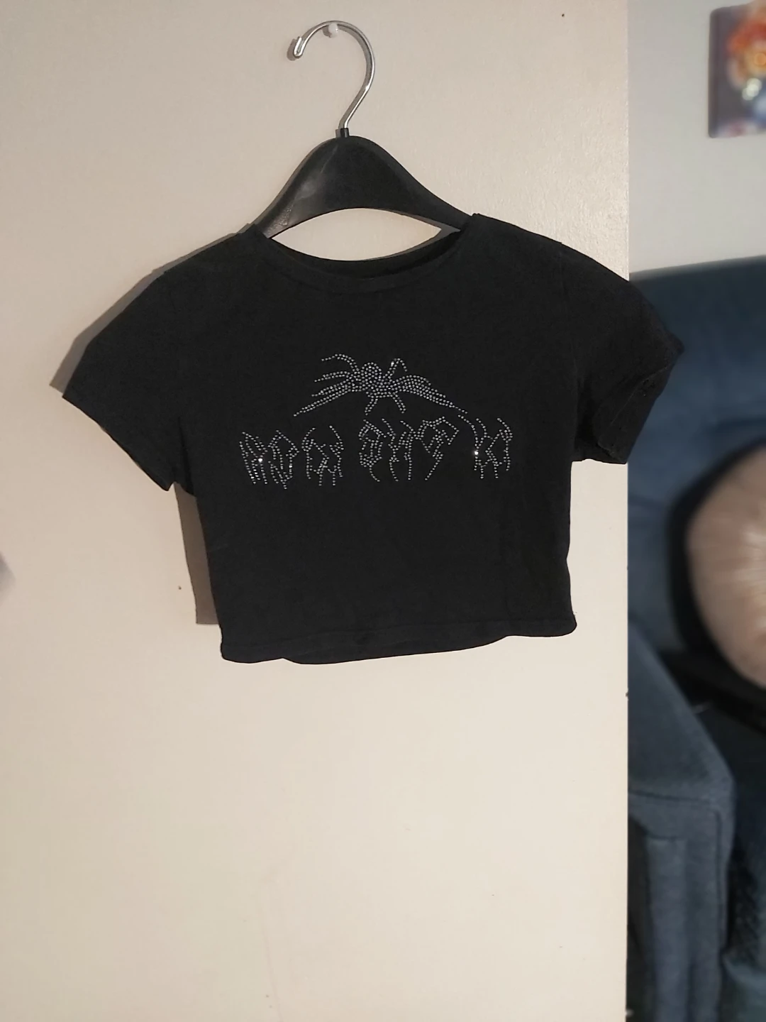 Black crop top with rhinestone graphic