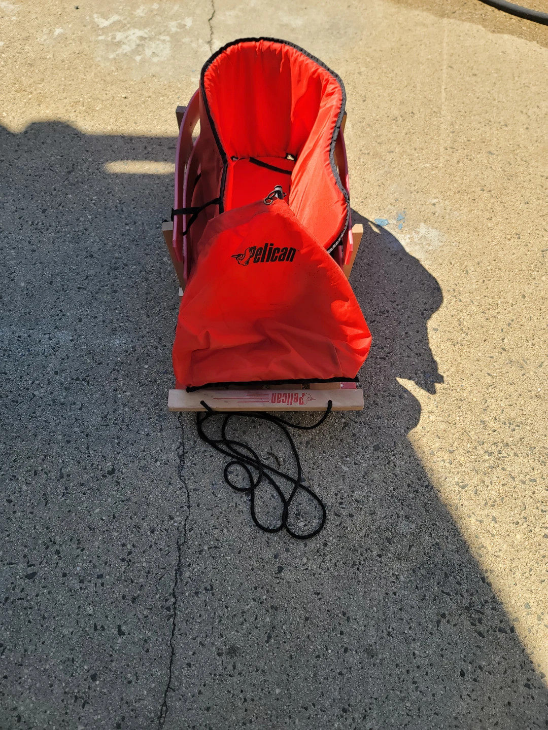 Pelican Wooden Sled with Red Accents