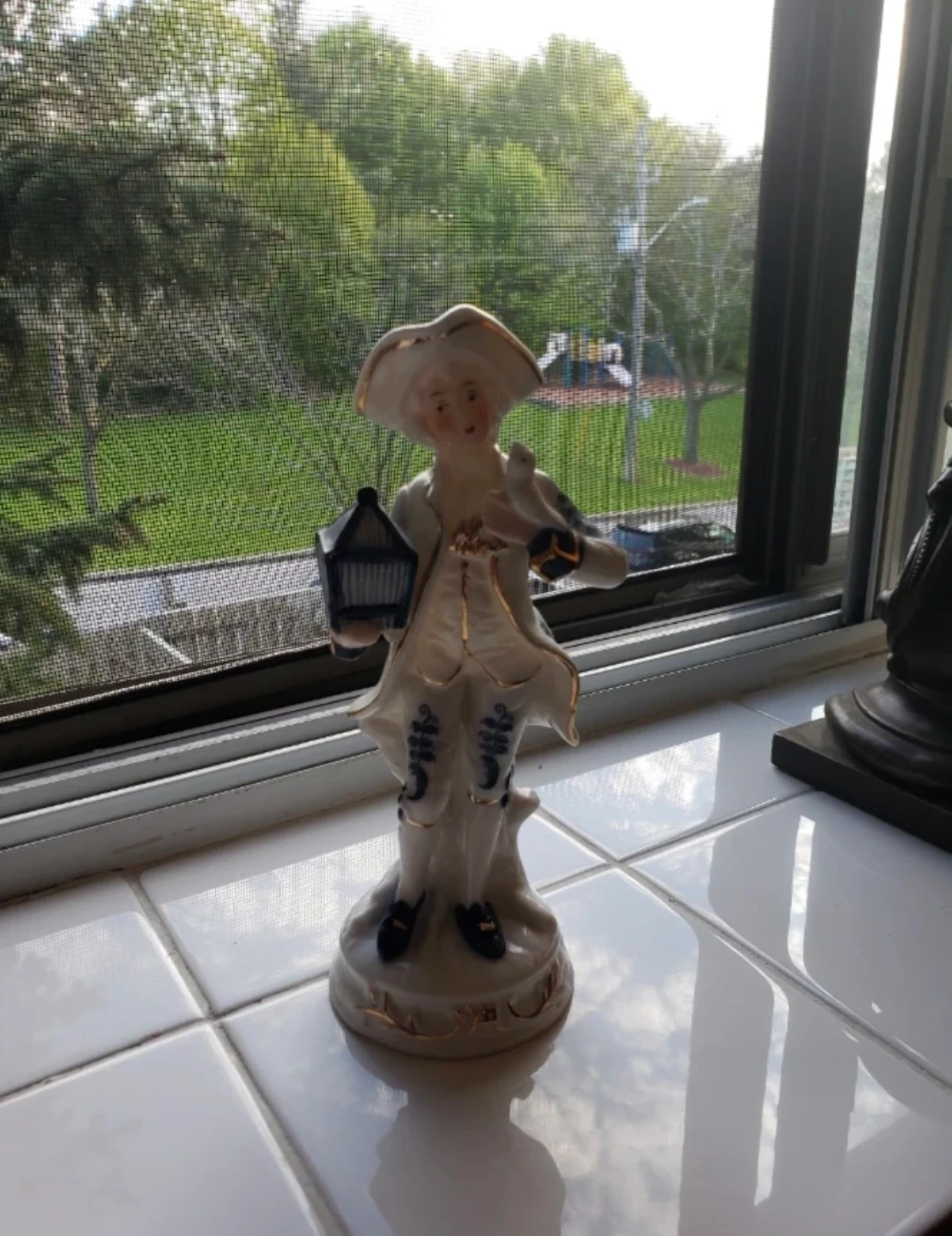 Porcelain Figurine Man with Bird Cage - photo 5