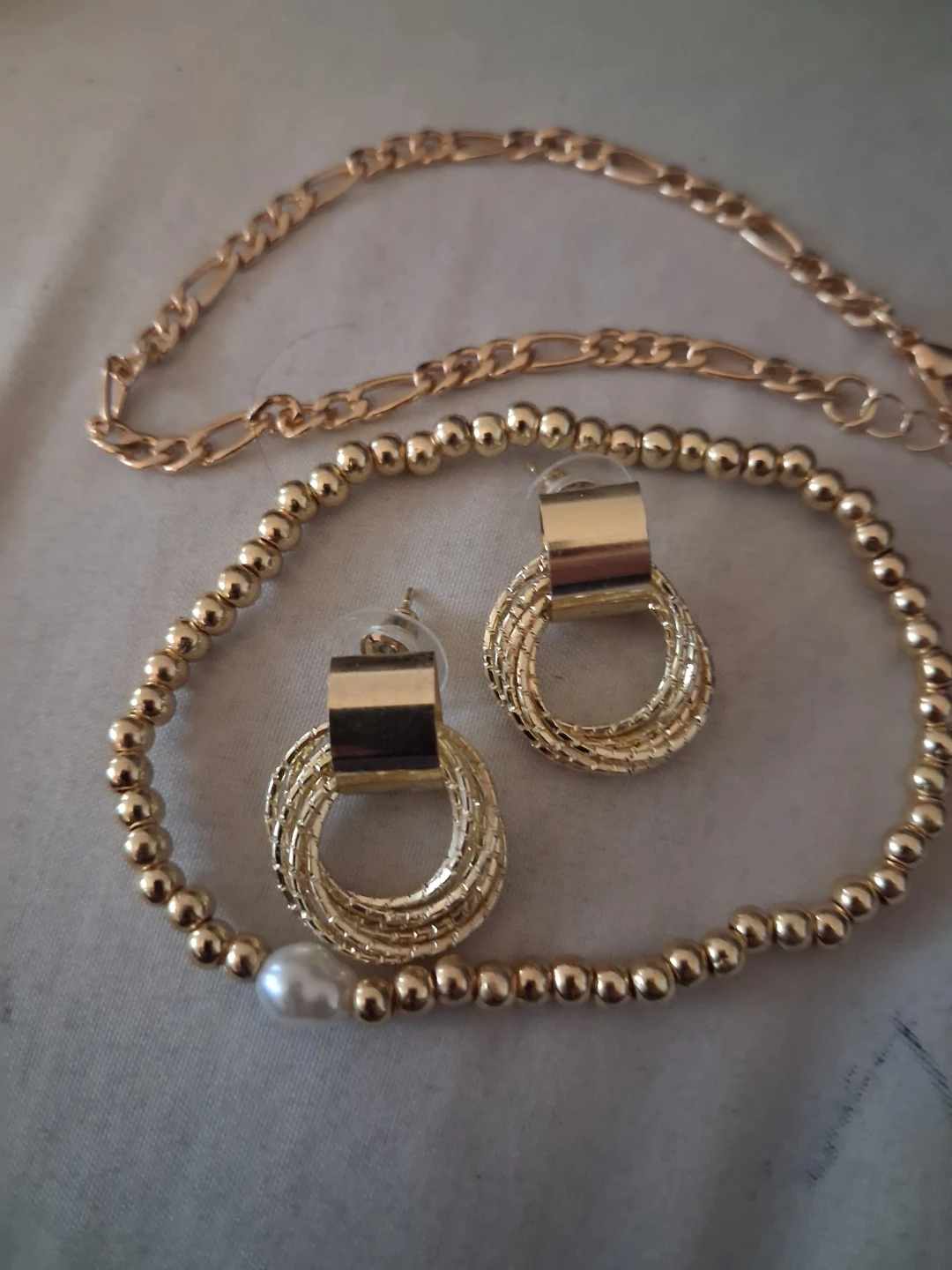 Gold tone bracelets and earrings set