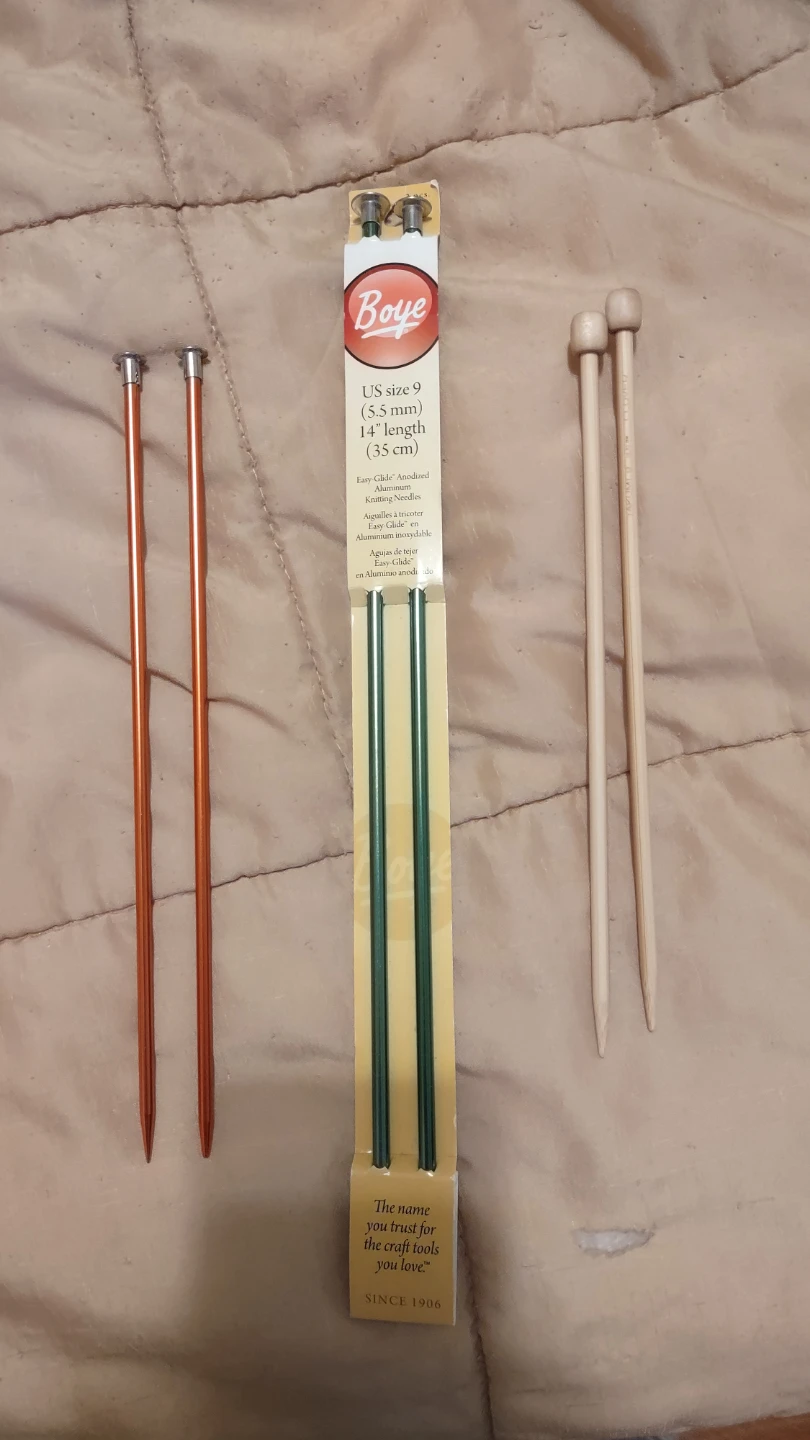 Three Pairs of Knitting Needles