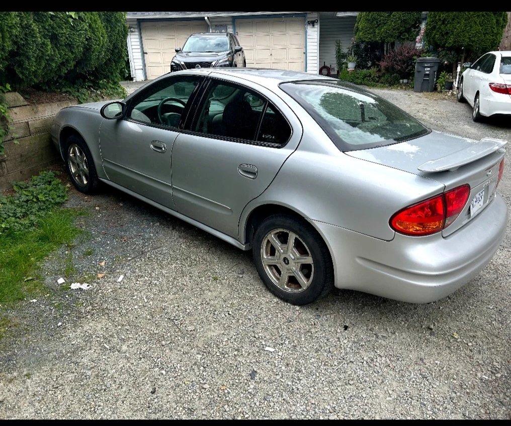 Silver Oldsmobile Alero Sedan - photo 2