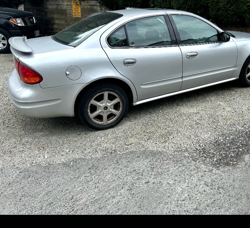 Silver Oldsmobile Alero Sedan - photo 4