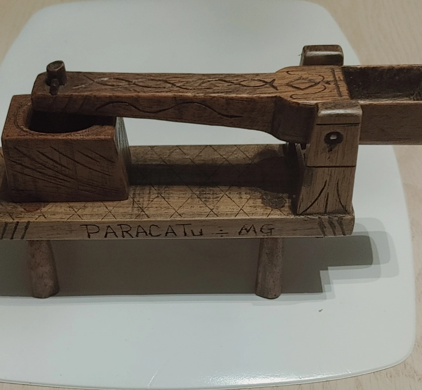 Hand-carved wooden press