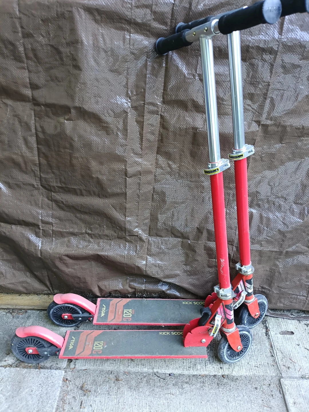 Two red scooters