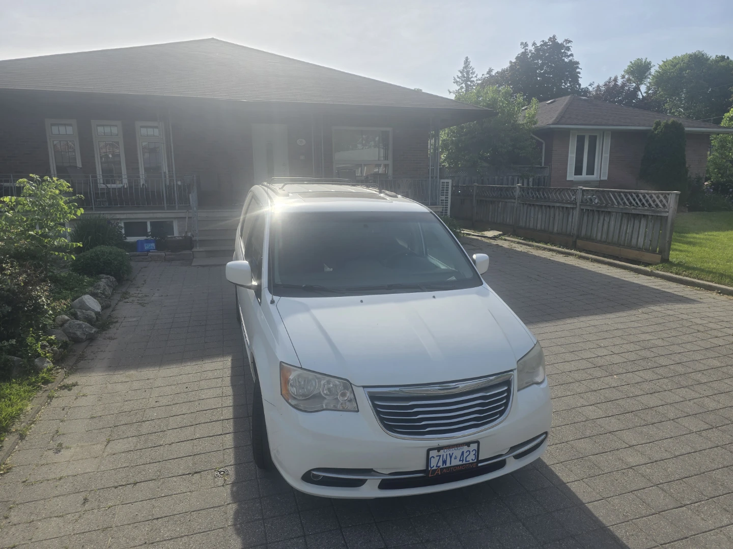 White Chrysler Town & Country Minivan
