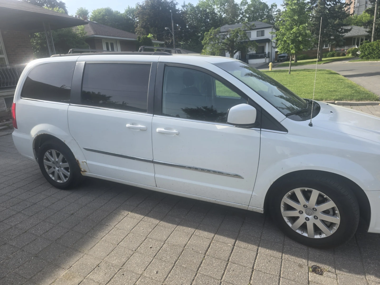 White Chrysler Town & Country Minivan - photo 2