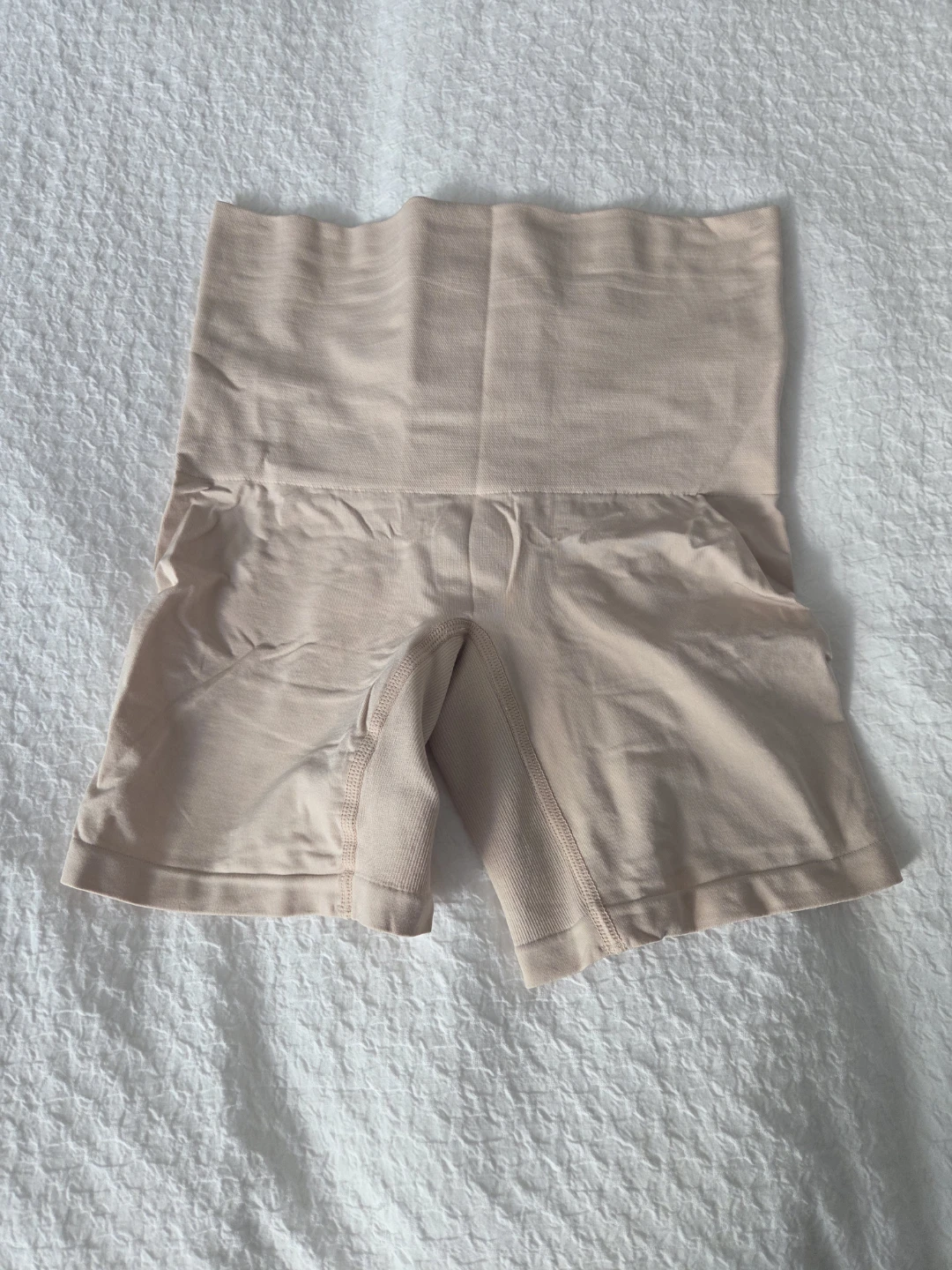 FREE beige compression slip shorts, size M