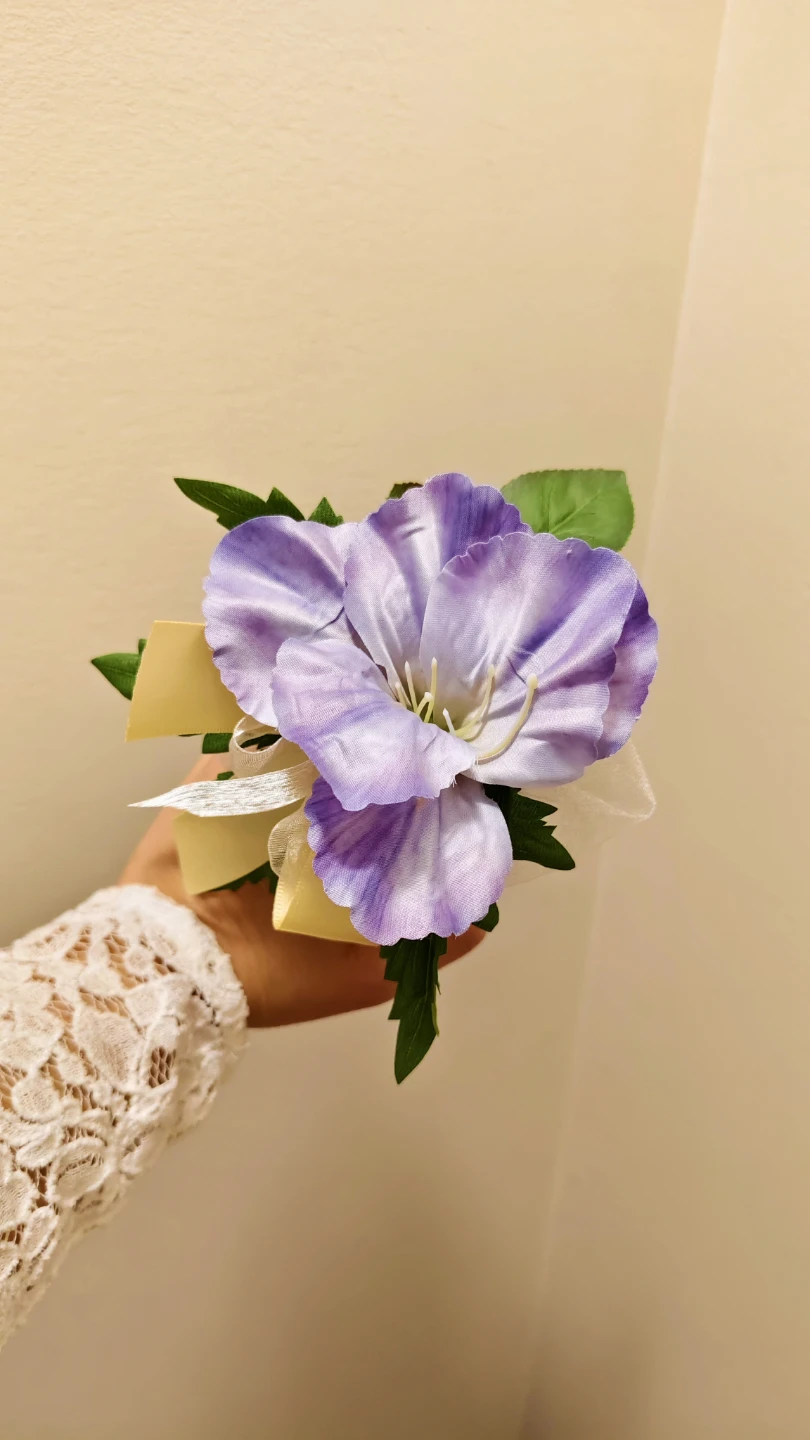 Artificial Purple Flower Corsage with Yellow Ribbon Accent
