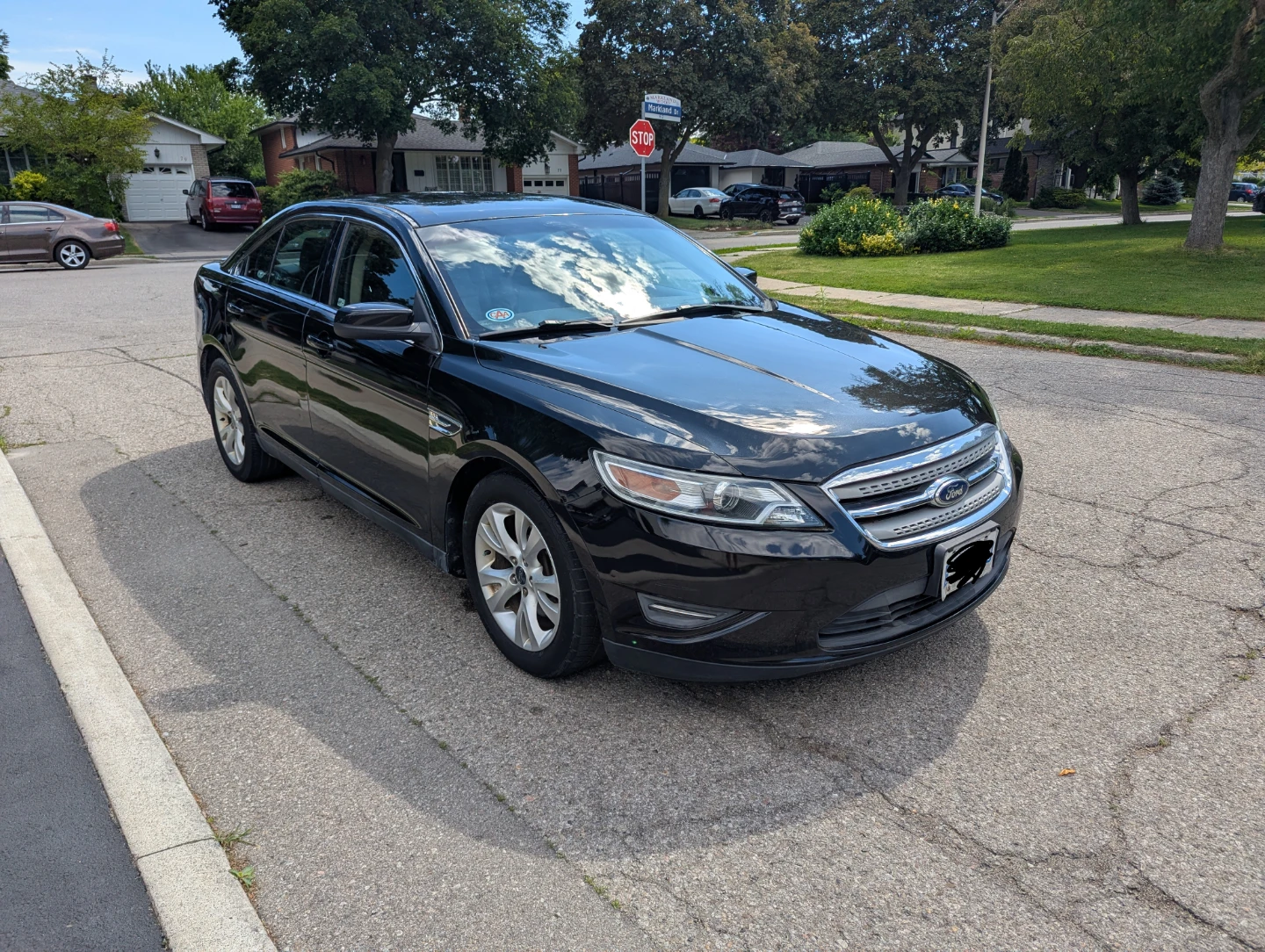 Black Ford Taurus SEL Sedan