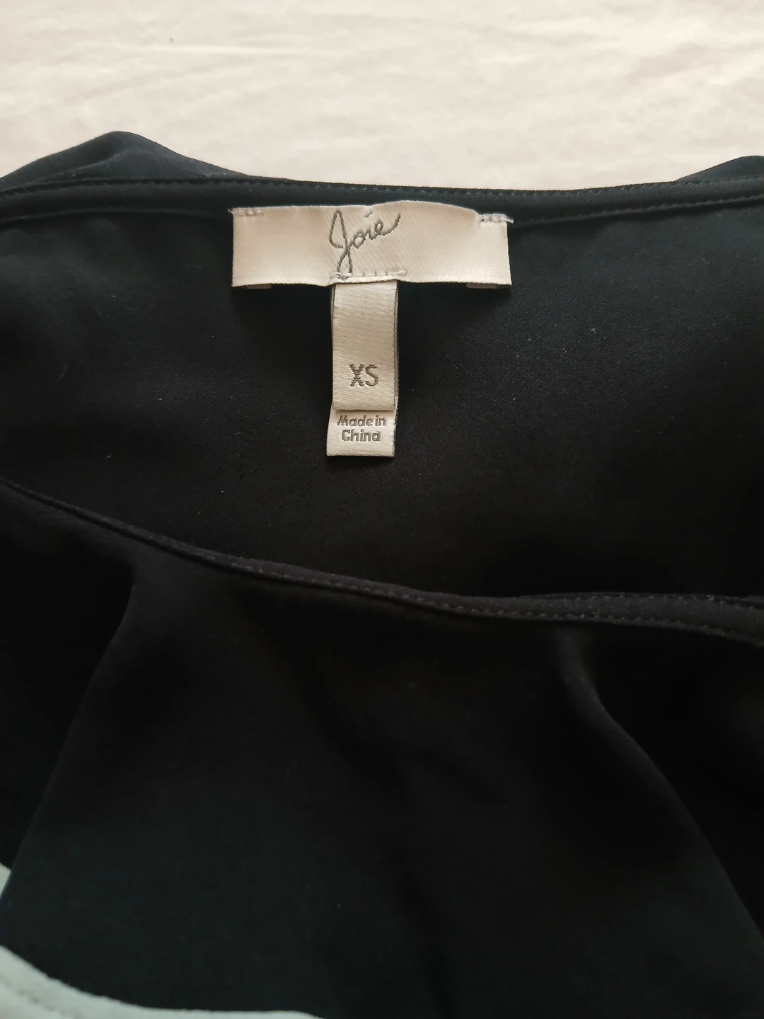 XS Joie Black Ruffle  Top  with light blue trim - photo 2