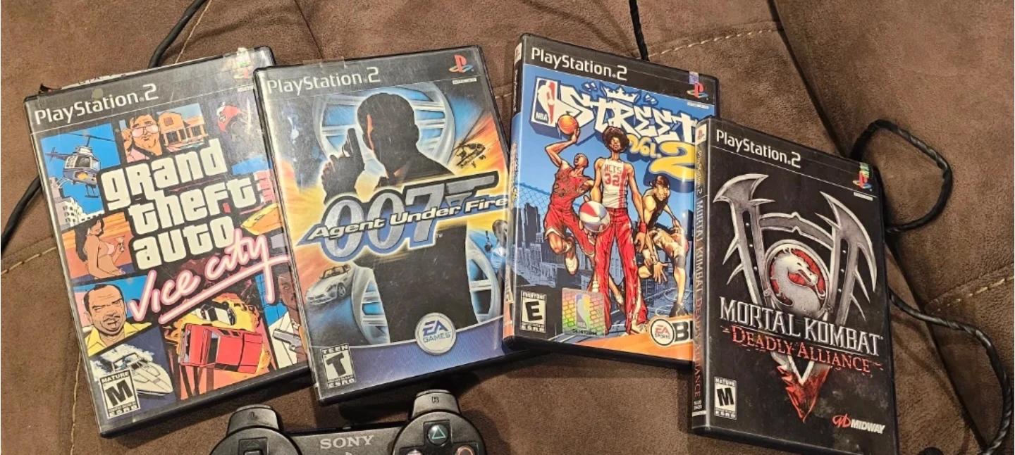 Sony PlayStation 2 Console with Games and Controllers - photo 4