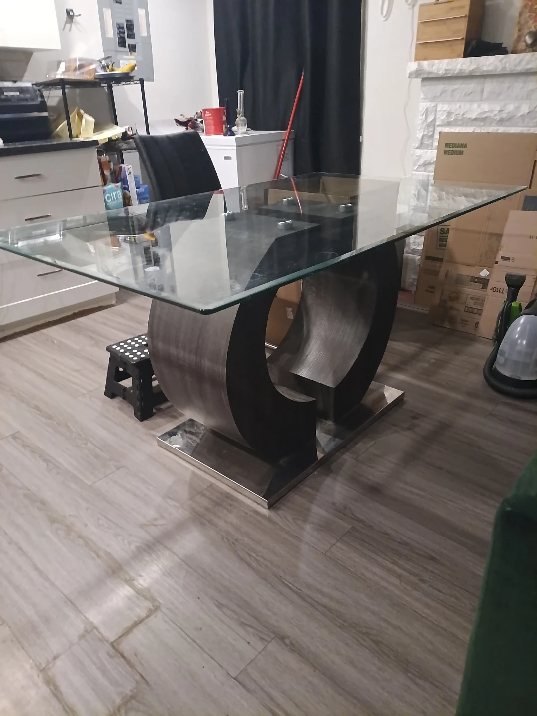 Glass Top Dining Table with Unique Pedestal Base