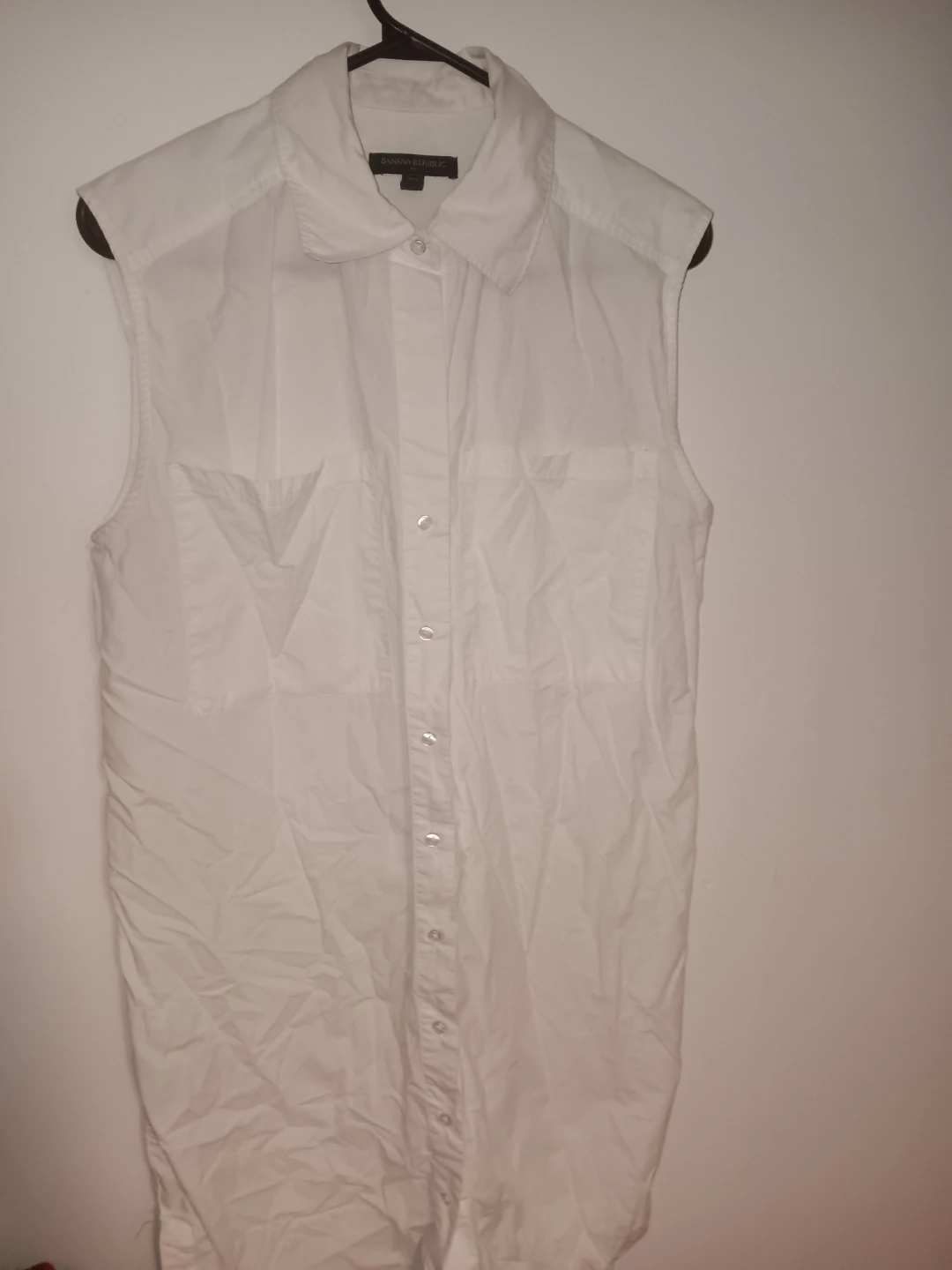 White Sleeveless Button-Up Shirt
