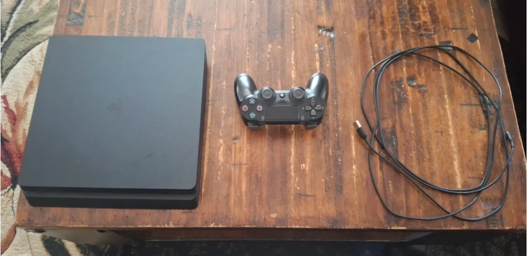 Sony PlayStation 4 Console with Controller and Cables
