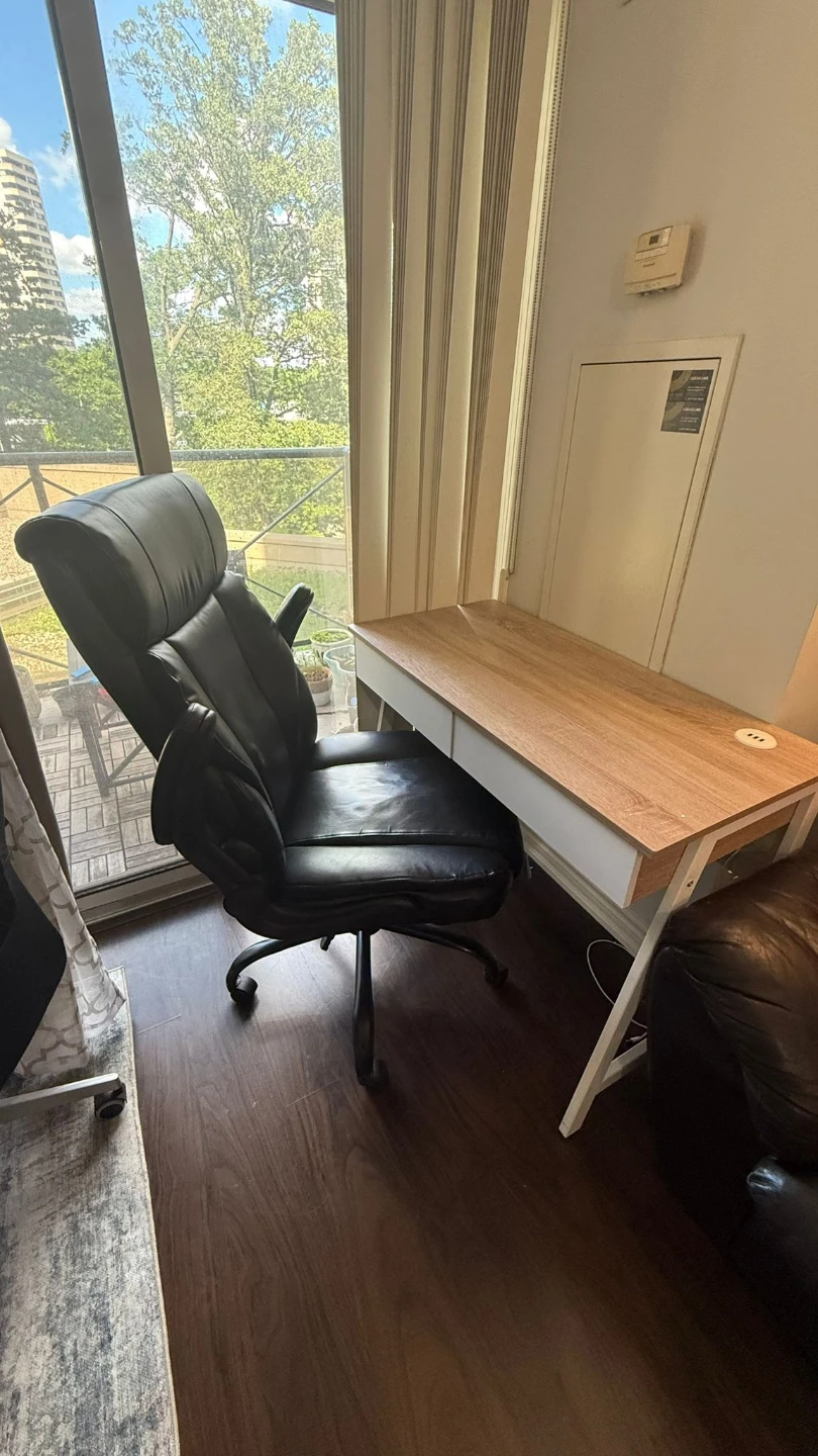 Office desk with black chair