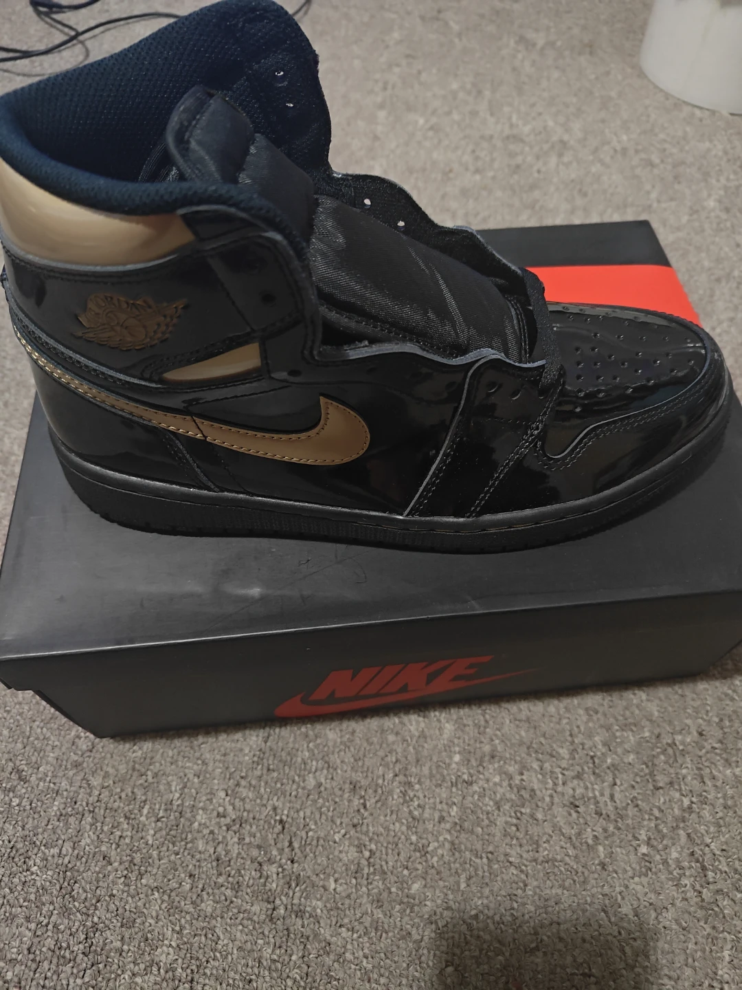 Jordan 1high Retro black metallic gold
