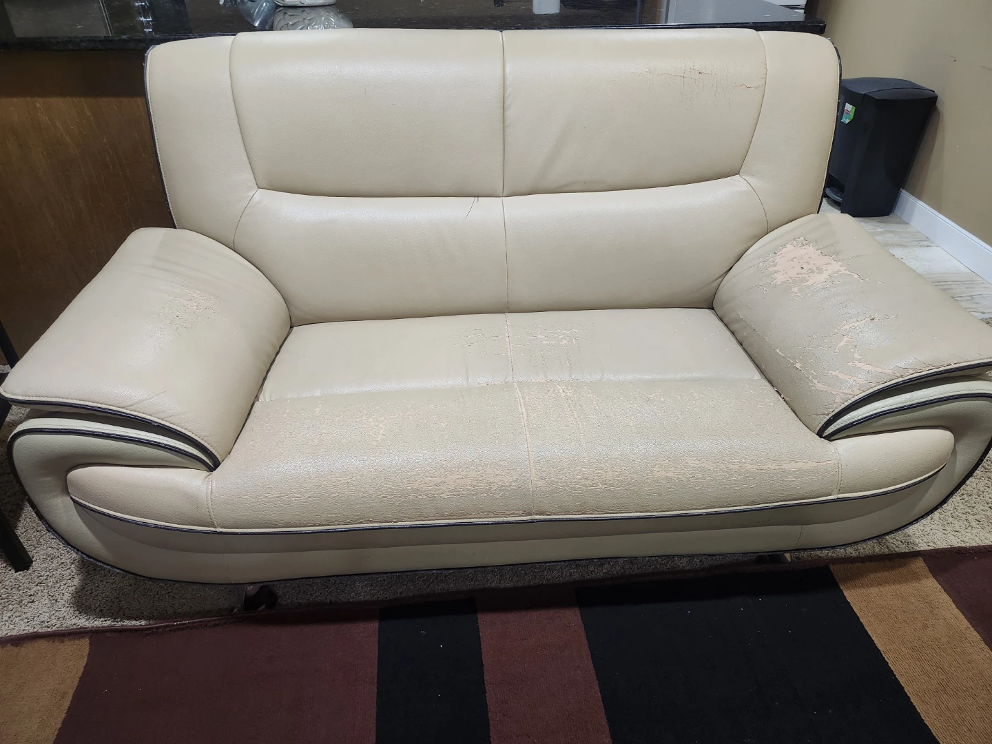Cream coloured sofa with wear and tear - photo 3
