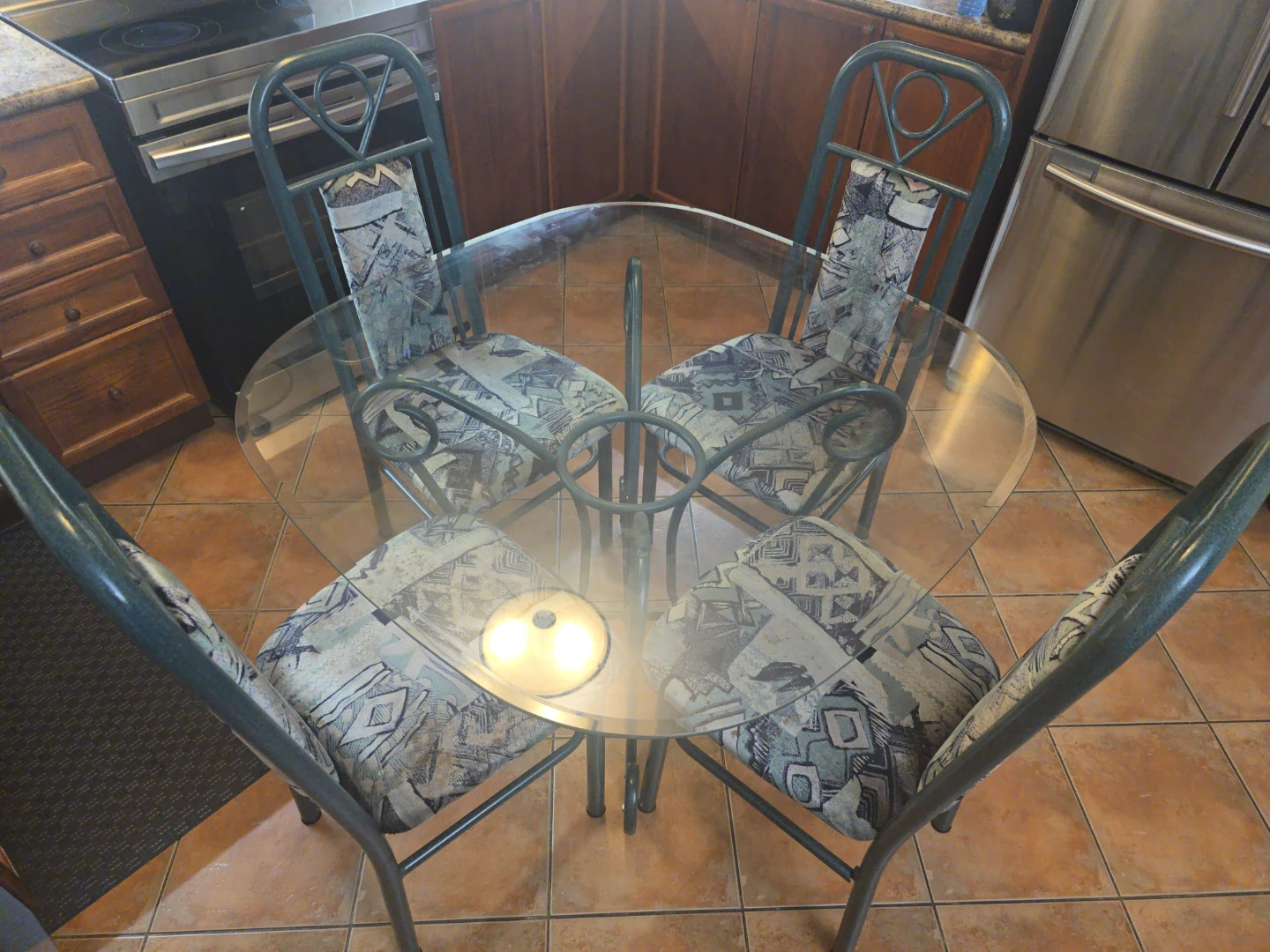 Glass top dining table with 4 chairs