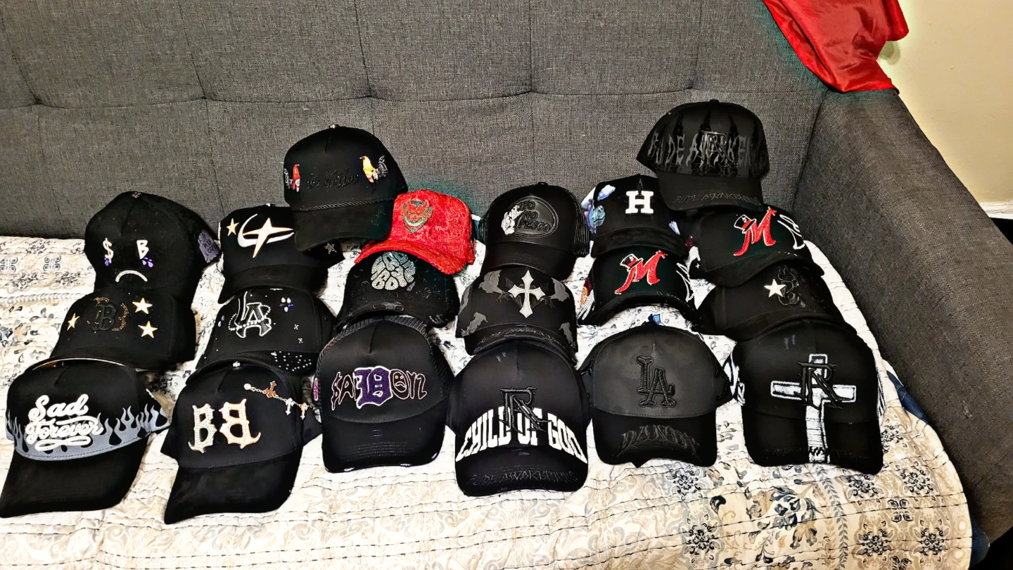 Assorted Black Trucker Hats with Various Designs