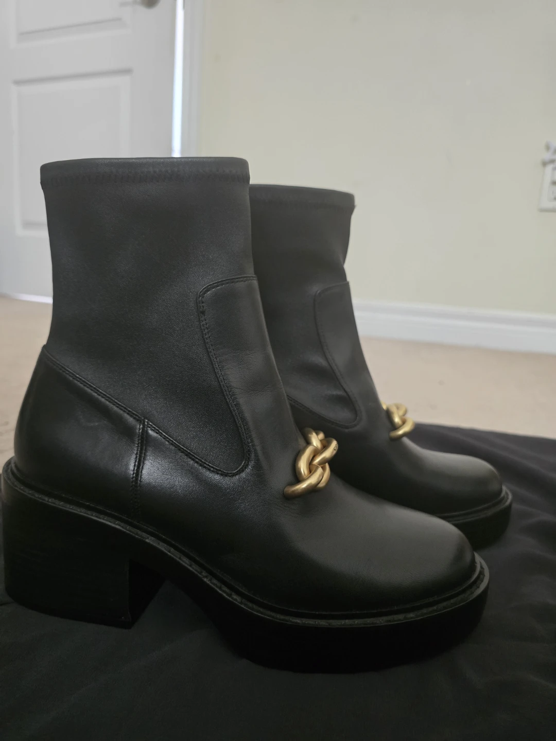 Coach Black Leather Ankle Boots with Gold Chain Detail