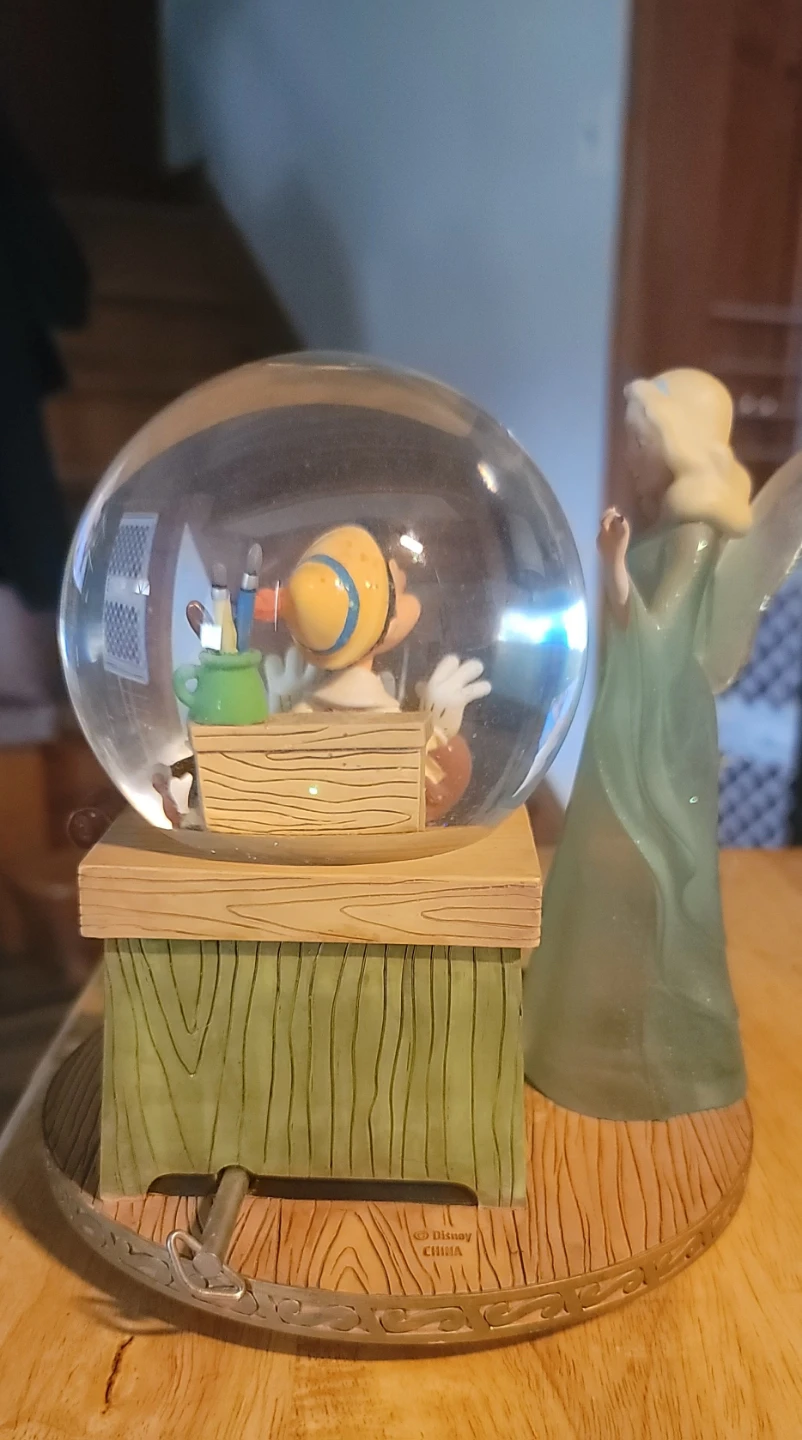 Retired Disney Pinocchio Musical Snow Globe - photo 3