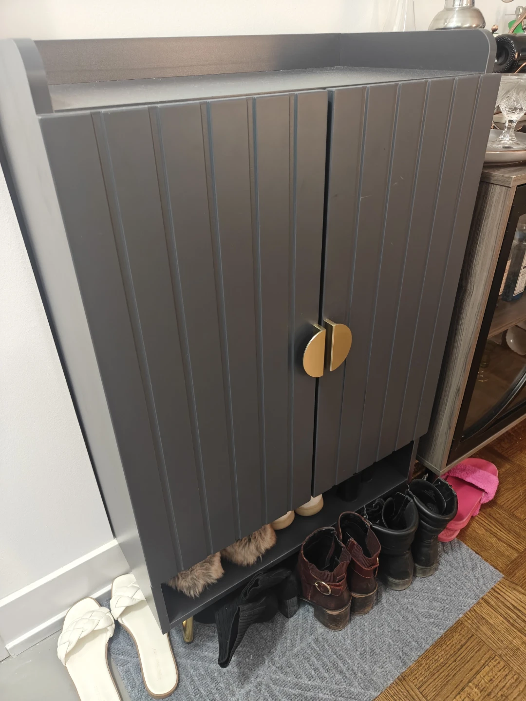 Grey and gold shoe cabinet
