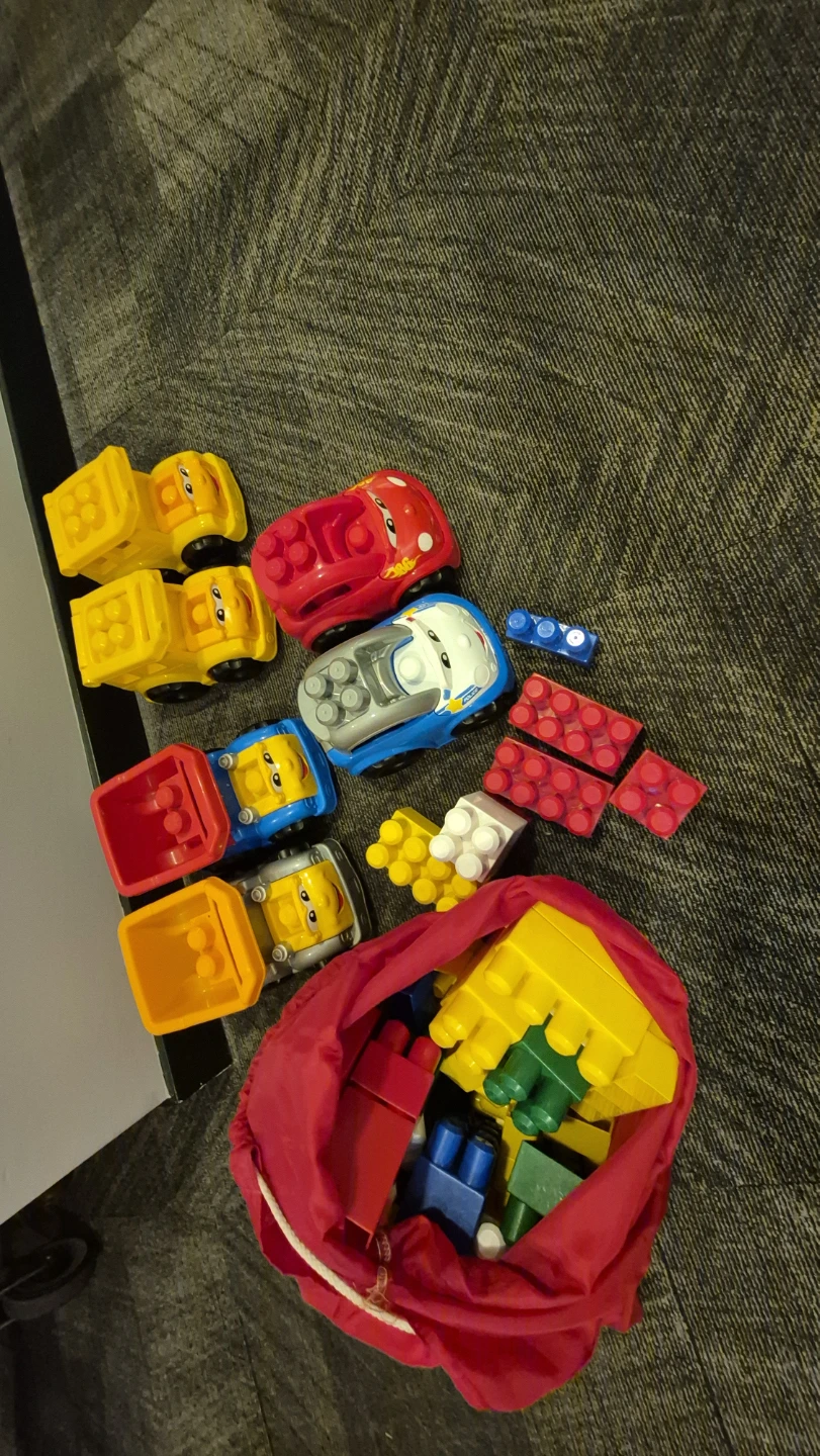 Assorted Toy Trucks and Building Blocks