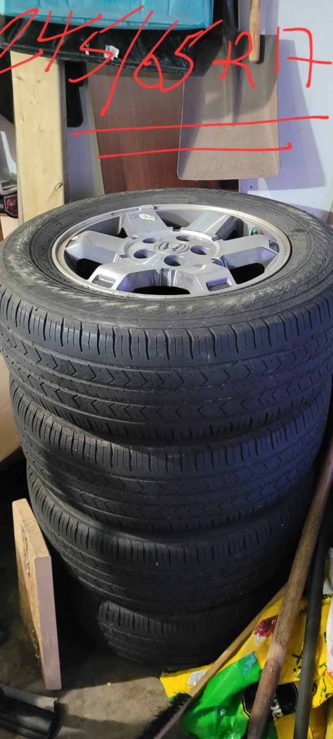 245 65 r17 with factory 2010 Honda pilot rims
