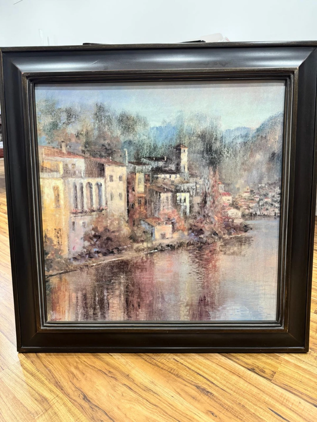 Framed Art Print of Riverside Town