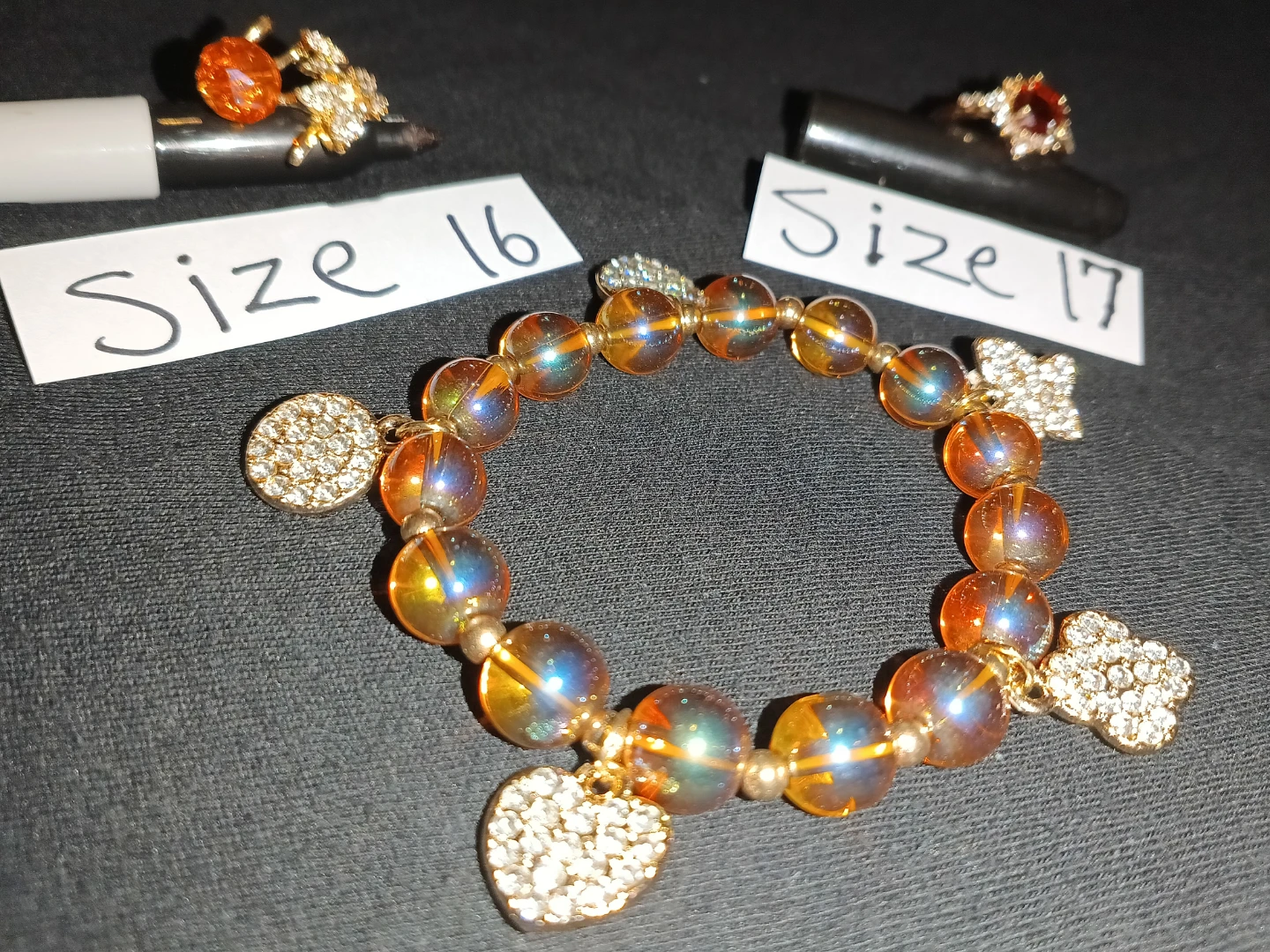 Beaded Bracelet with Charms and Red Gemstone Ring - photo 3