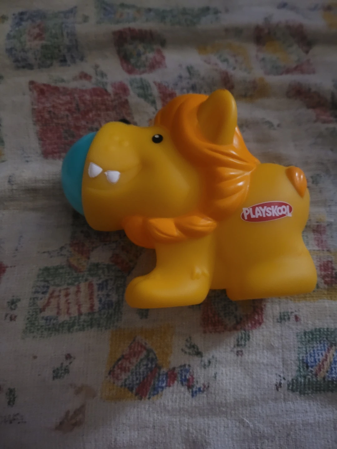 Playskool Poppin' Park Squeeze 'N Pop Lion toy.