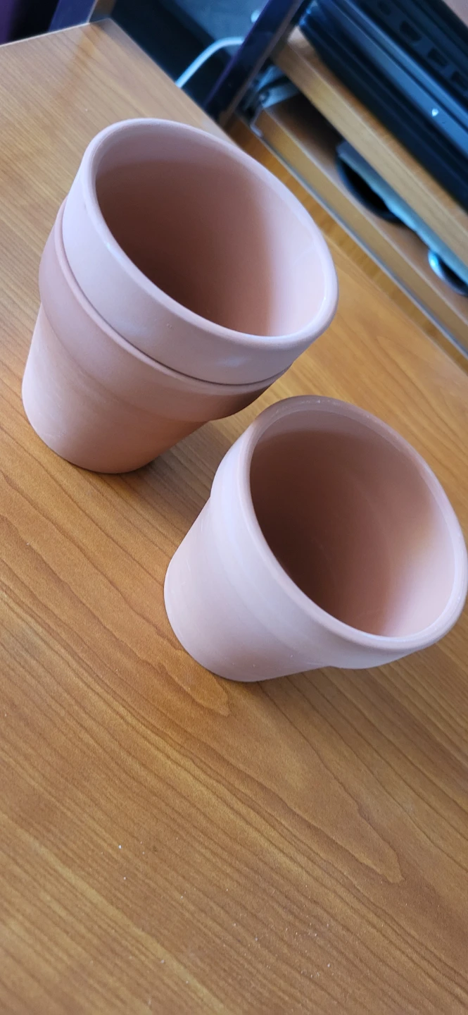 Three terracotta plant pots