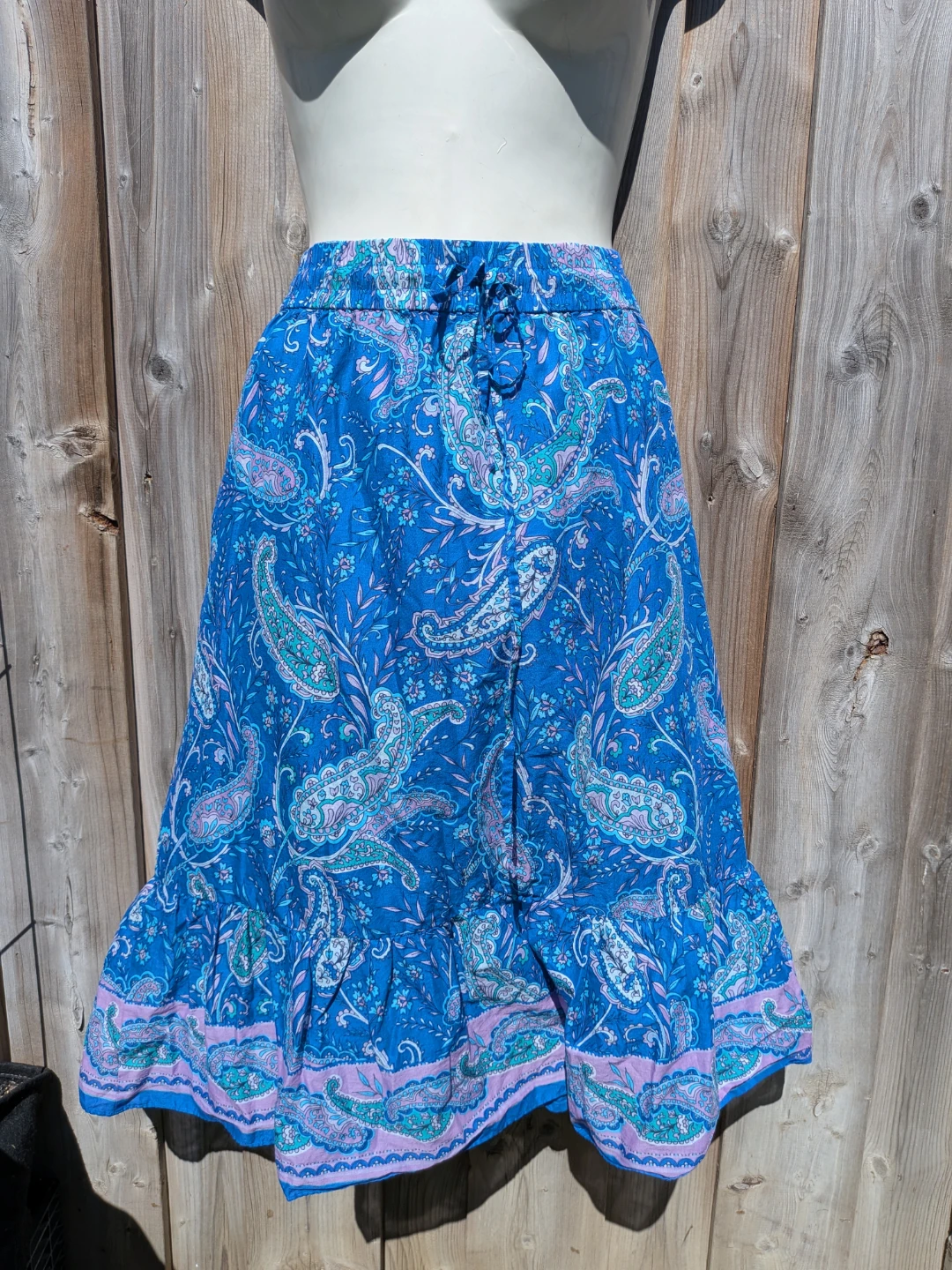Blue paisley print midi skirt with tiered ruffle hem