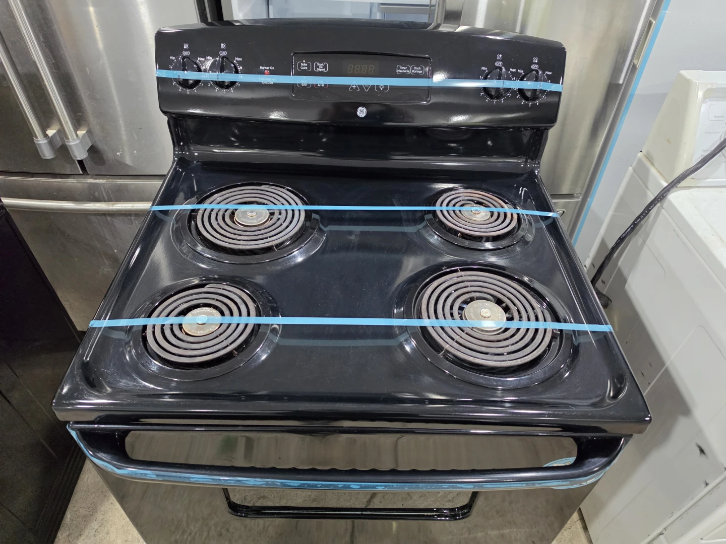 GE 30" Black Coil Top Stove - photo 2