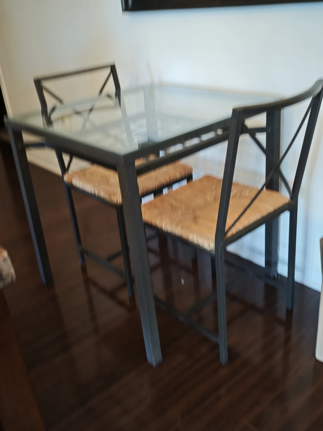 Glass Top Dining Table with Woven Seat Chairs