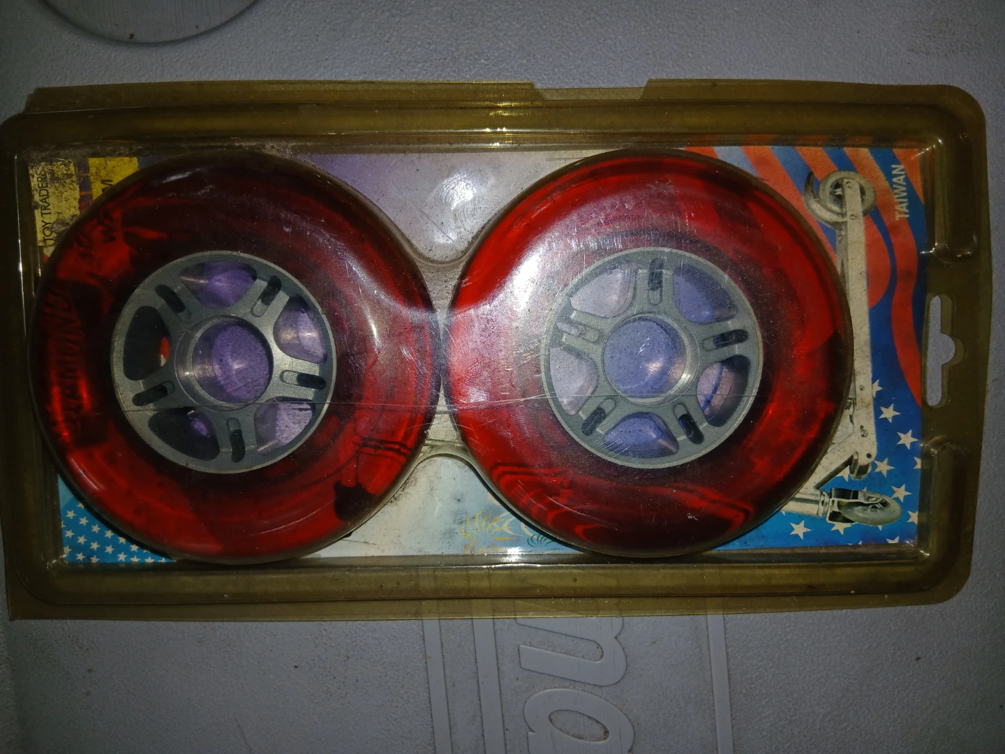 Two Red scooter Wheels