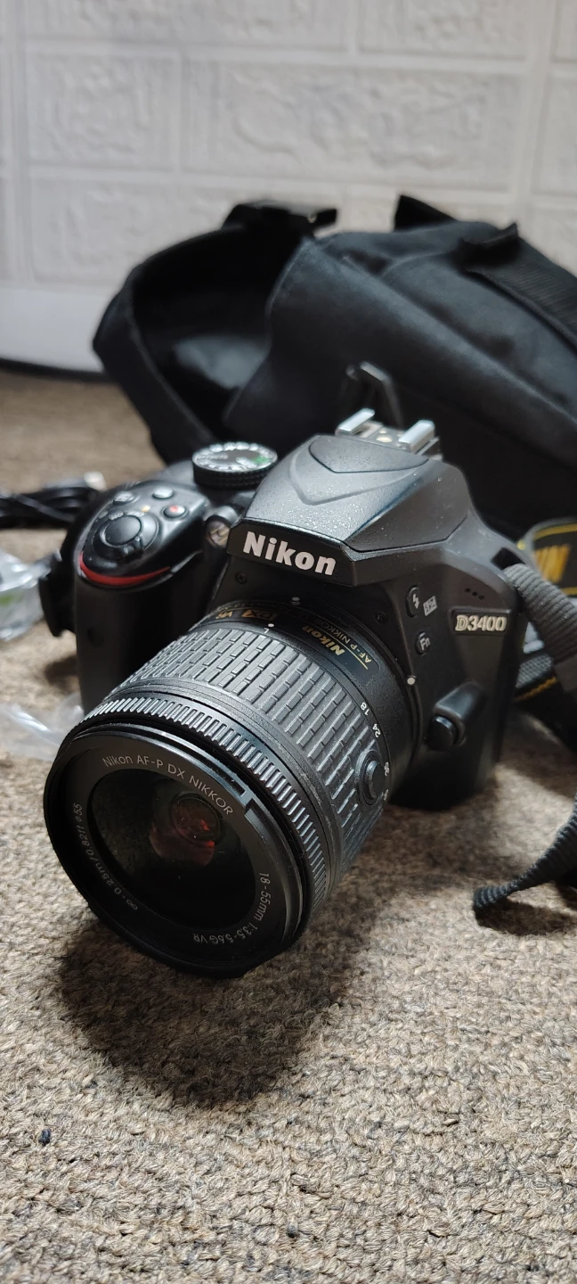 Nikon D3400 DSLR Camera with 18-55mm Lens and Bag