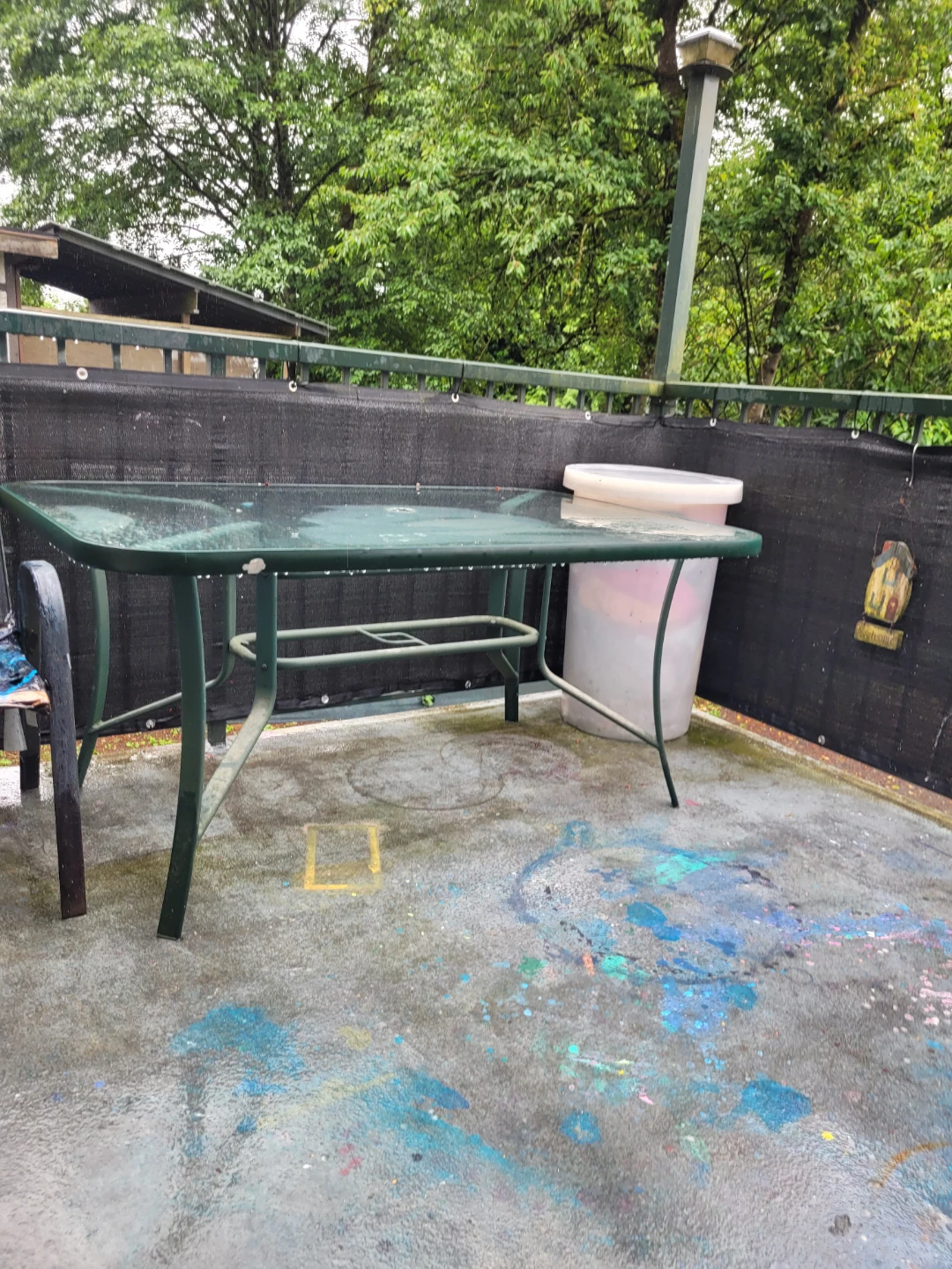 Glass Top Patio Table and random garden deco