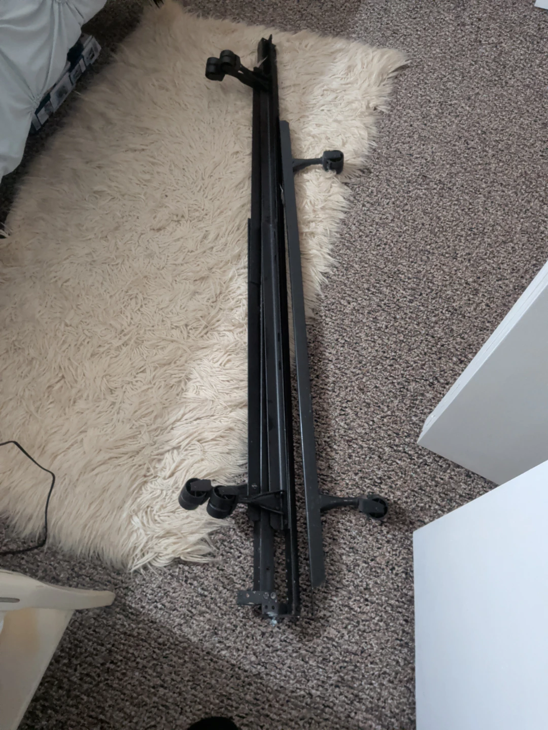 Queen size bed frame with bolts and wheels