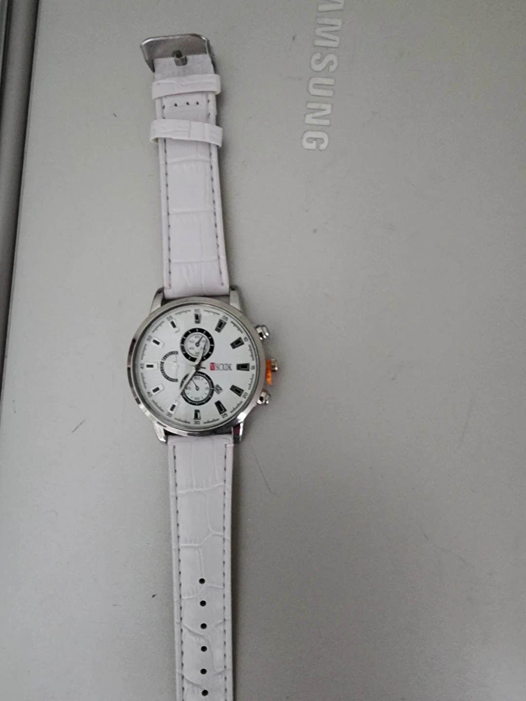 Brand new SCXDK White Faux Leather Watch