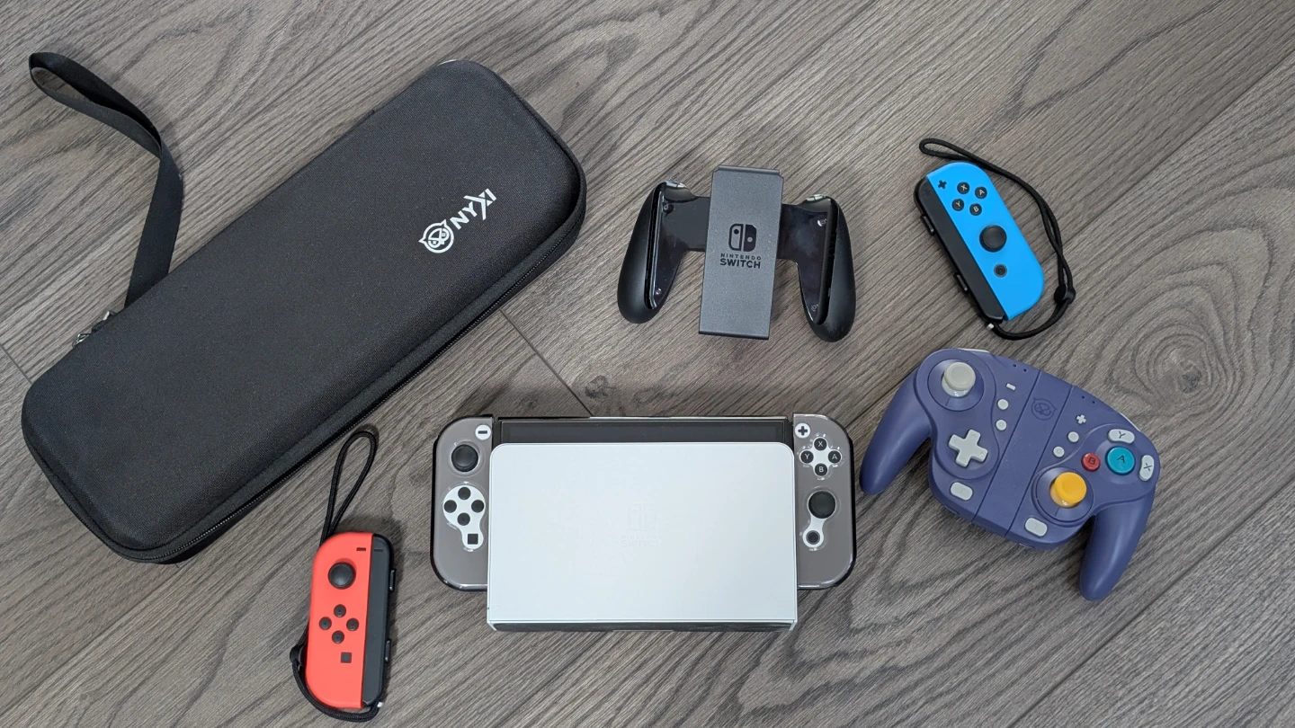 Nintendo Switch OLED + Extras - photo 2