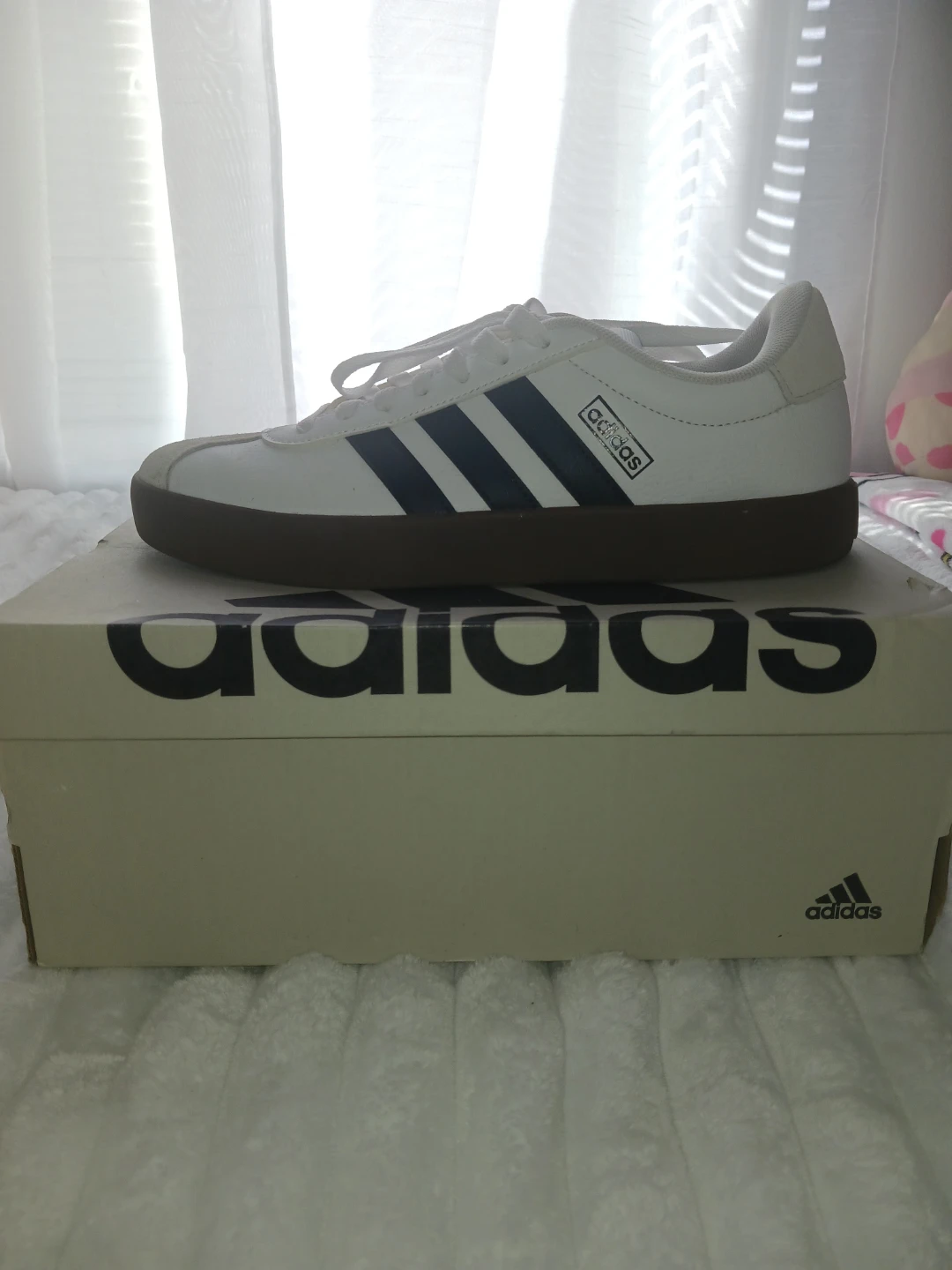 Adidas white and black sneakers with gum sole