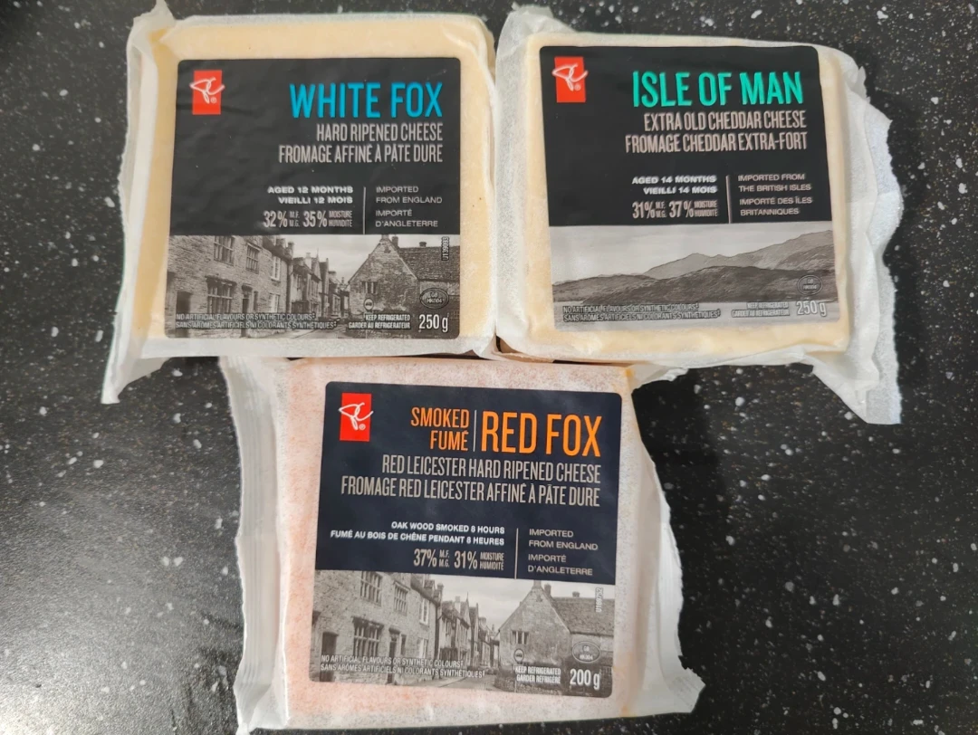 Selection of PC Cheeses: White Fox, Isle of Man Cheddar, Red Fox