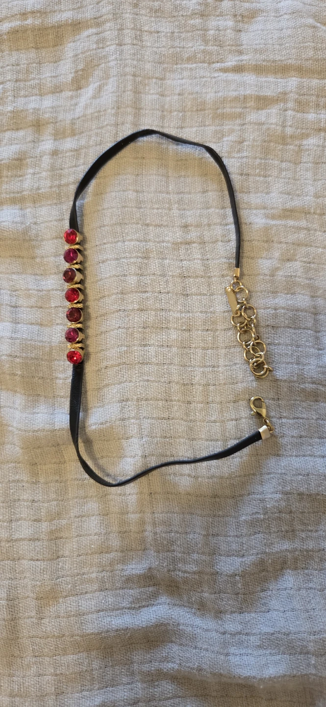Black choker with red and pink gems
