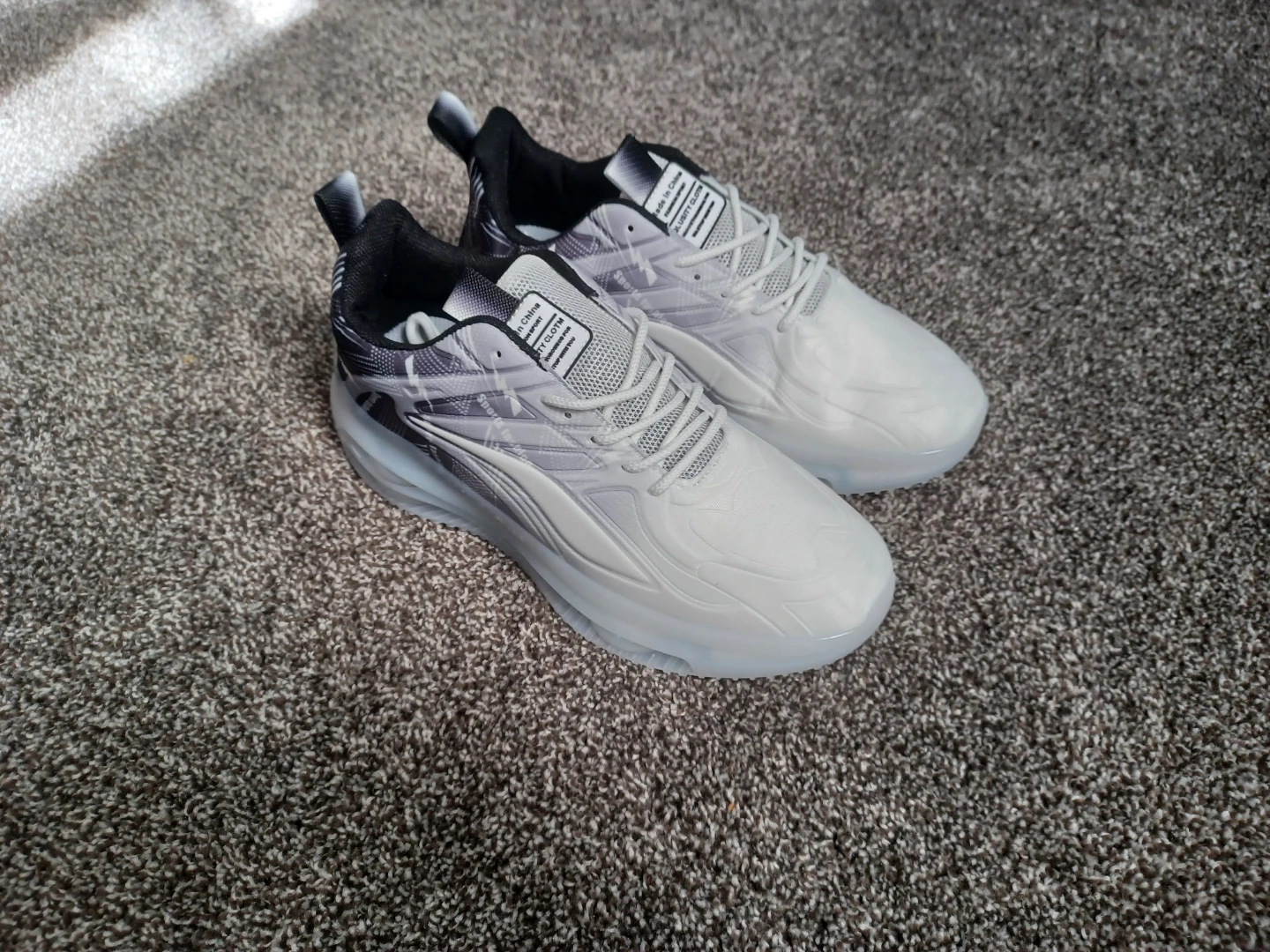 White and Black Athletic Shoes